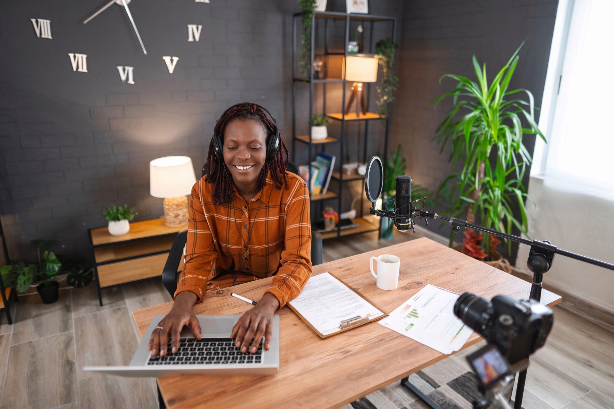 Content creator recording a podcast in a home studio